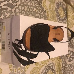 Black slip on knit sandals